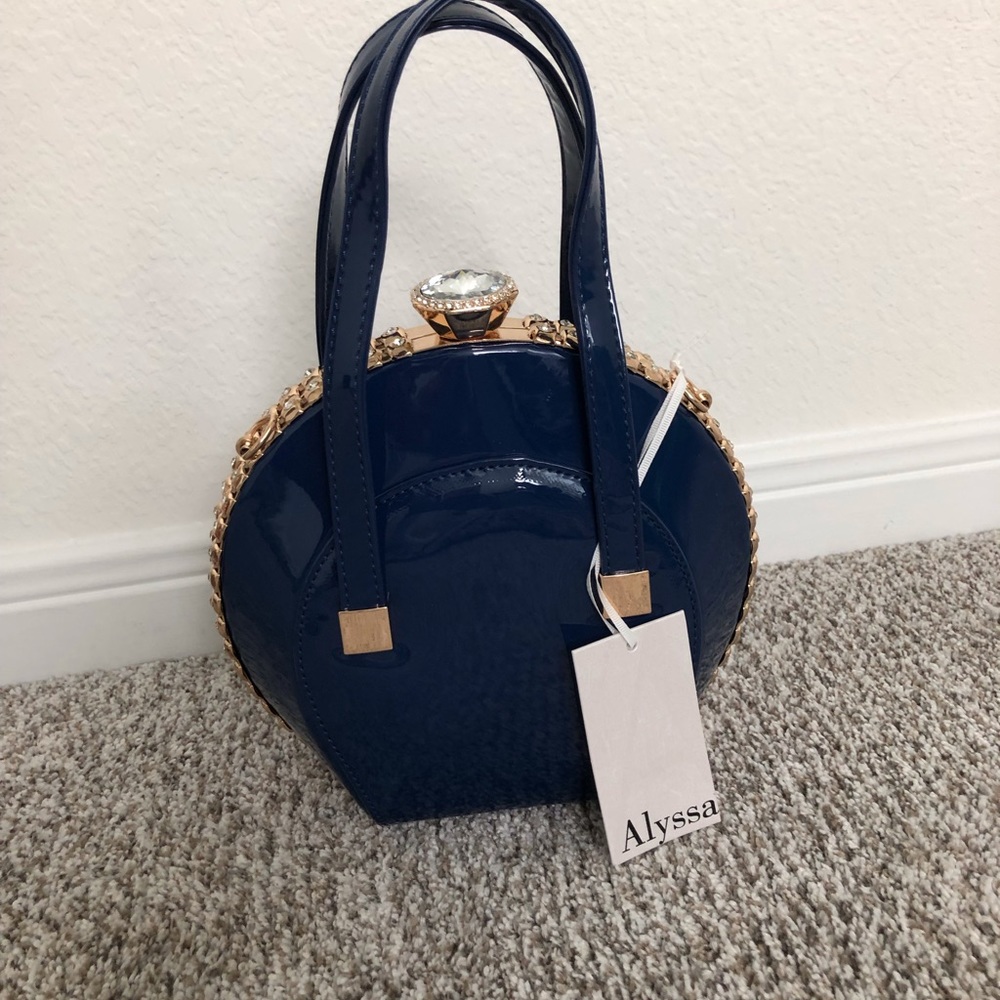 Alyssa Ladies Patent Party Clutch with Rhine stones.